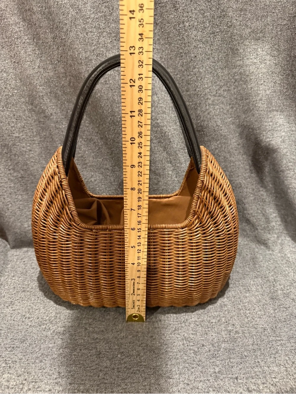 Woven Brown Rattan Basket Handbag w/Black Handles Pre-owned. Good condition